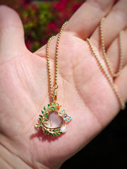 18k Yellow Gold Antique Rock Crystal Locket Brooch with Enameled Leaf Branches, Ribbon Bow & White Dove | Indulgems