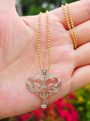 14k Gold Celestial Scrolling Motif Diamond Pendant | Indulgems | Antique Revival