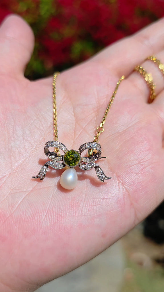 Platinum Antique Diamond Pave Ribbon Bow Brooch with Peridot | Indulgems