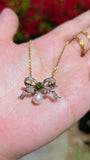 Platinum Antique Diamond Pave Ribbon Bow Brooch with Peridot | Indulgems