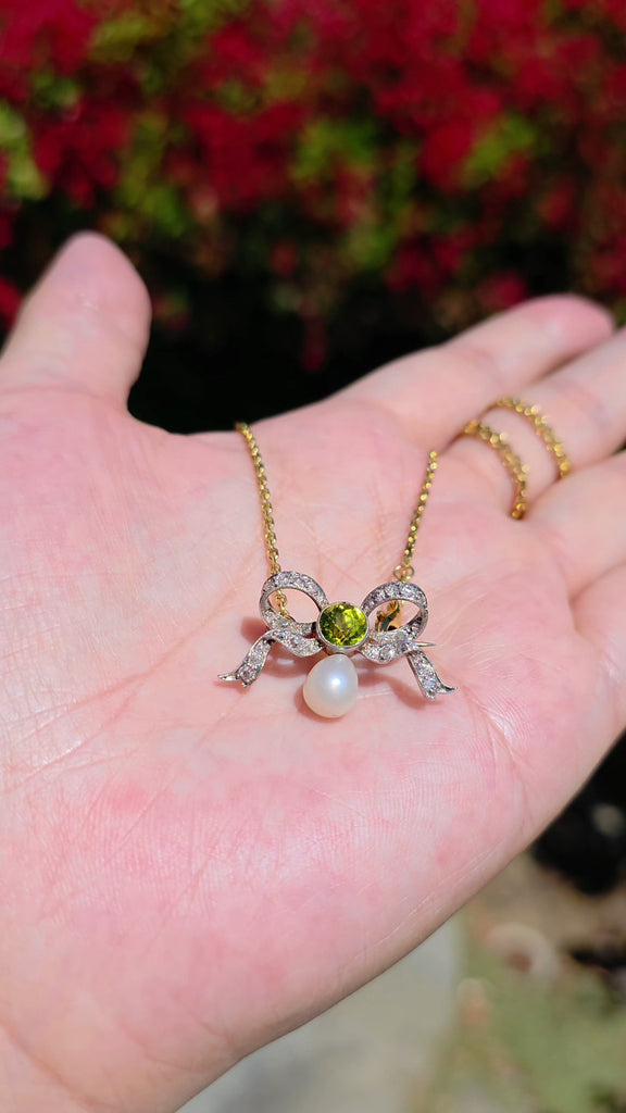Platinum Antique Diamond Pave Ribbon Bow Brooch with Peridot | Indulgems