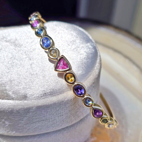 14k Yellow Gold Chubby Donut Bezel Fancy Sapphire Cuff Bangle | Indulgems