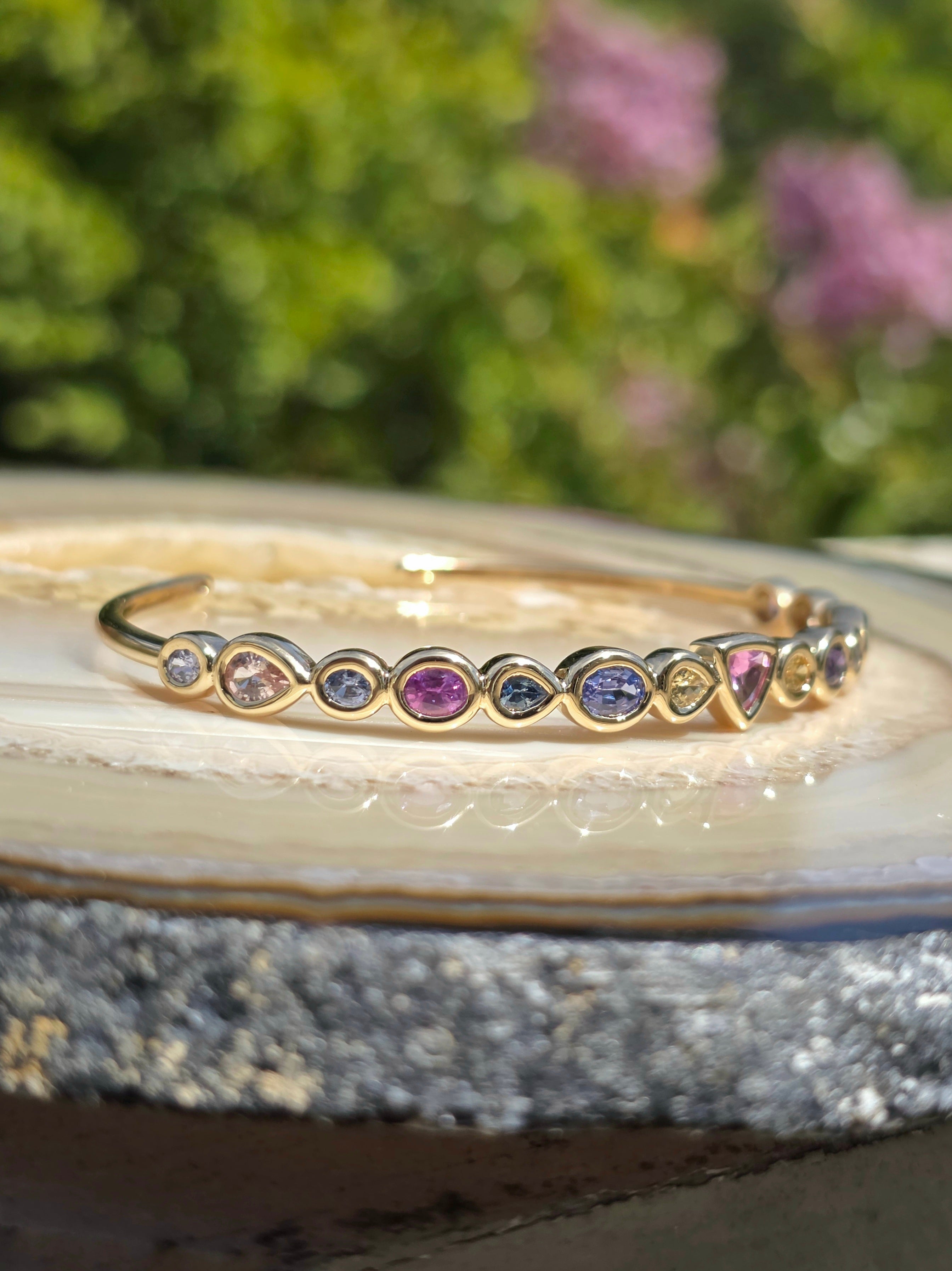 14k Yellow Gold Chubby Donut Bezel Fancy Sapphire Cuff Bangle | Indulgems