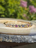 14k Yellow Gold Chubby Donut Bezel Fancy Sapphire Cuff Bangle | Indulgems