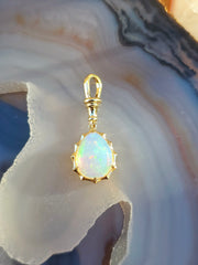 14k Yellow Gold Aurora Pendant with Ethiopian Opal Cabochon | Indulgems