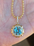 11.8ct Blue Zircon Aurora Halo Pendant in 14k Yellow Gold | Indulgems